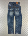 Vintage Big Train y2k Tribal Embroidered japanese jeans 00s